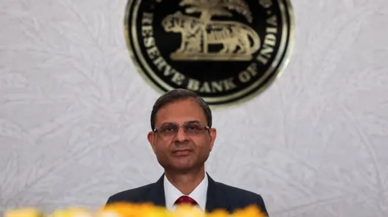RBI Governor outlines Tata Sons listing rules