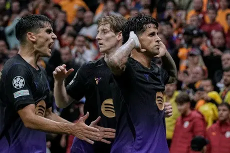  Barcelona and Arsenal shine in Champions League victories