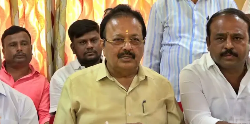 Minister defends school work video amid outrage