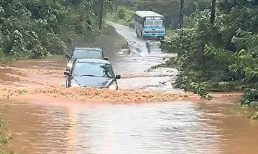 Heavy downpour disrupts life; floodwaters enter Adi Subrahmanya temple, bridge submerged
