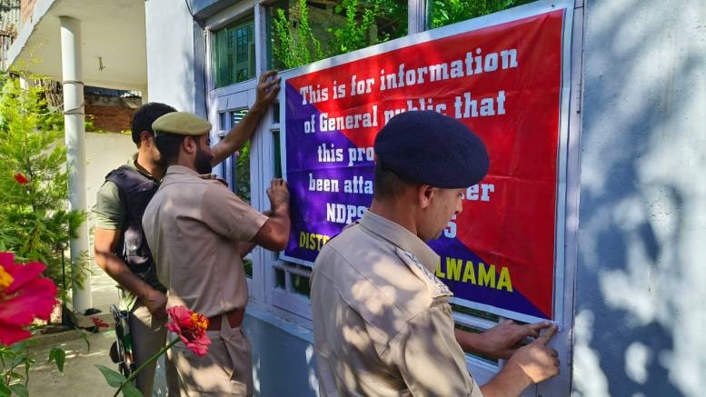 Srinagar police attach properties worth Rs 5.60 cr
