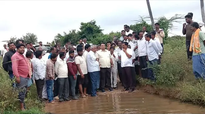MLA B.N. Ravikumar Inspects Flooded Road and Addresses Public Grievances
