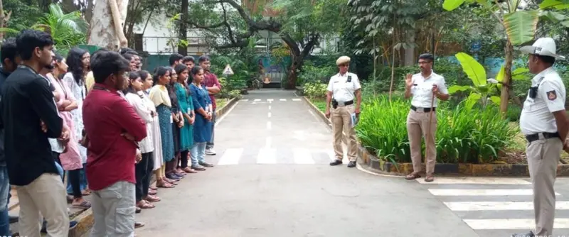 Adugodi police educate students on road safety