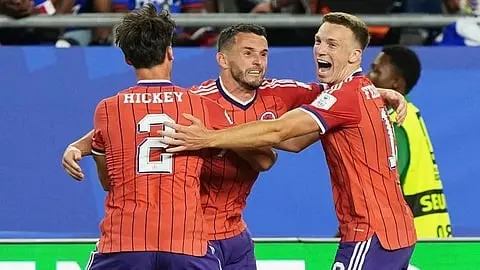 McGinn fires Scotland past Haiti in winning World Cup return