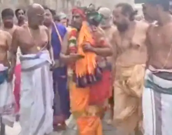 Welcomed with grand palanquin procession, offers blessings to devotees