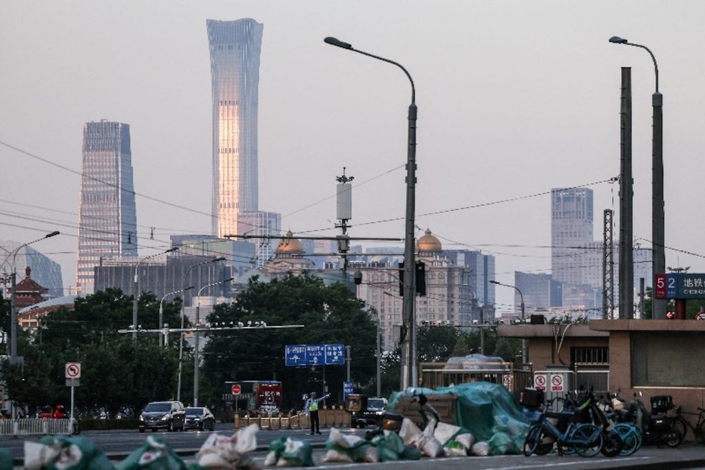 China tightens foreign travel curbs